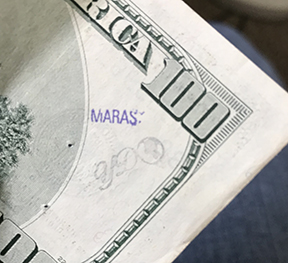 maras stamp on 100 bill