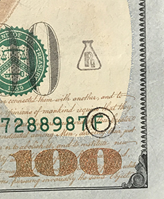 Beaker with R and circle stamp on $100