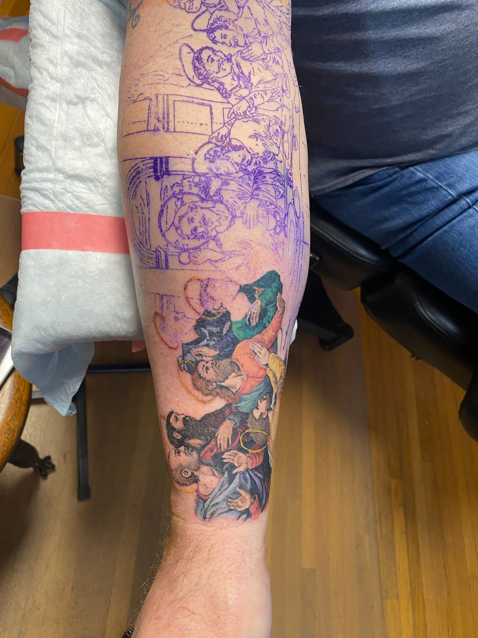 First session Last Supper tattoo lower right arm